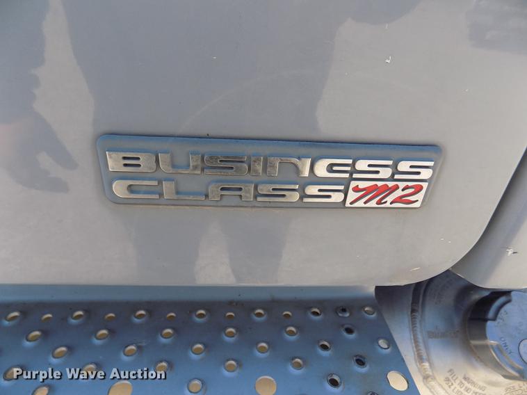 image for item DE1179 2004 Freightliner Business Class M2 hay bale stacker truck