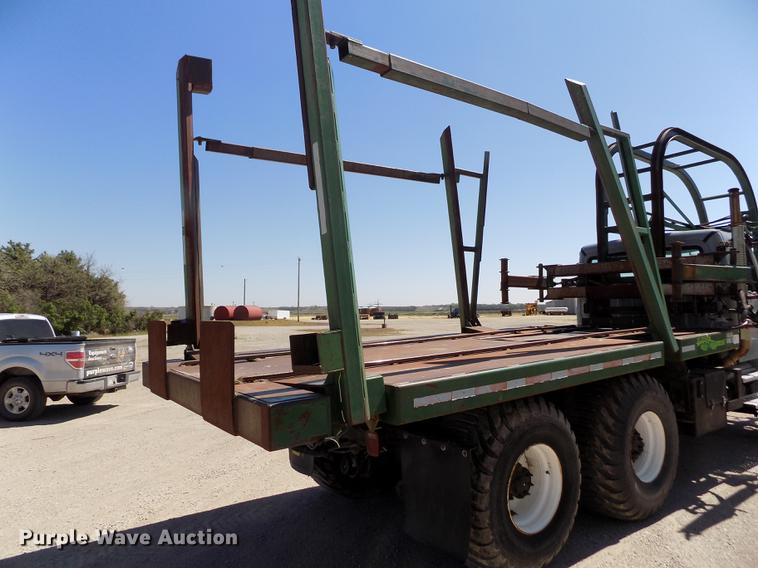 image for item DE1179 2004 Freightliner Business Class M2 hay bale stacker truck