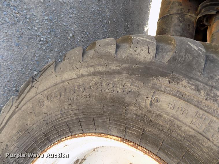 image for item DE1179 2004 Freightliner Business Class M2 hay bale stacker truck