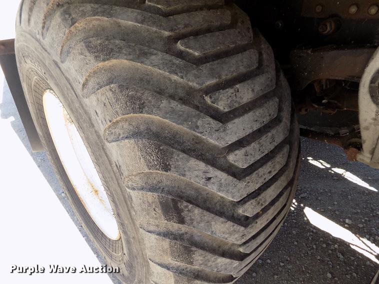 image for item DE1179 2004 Freightliner Business Class M2 hay bale stacker truck