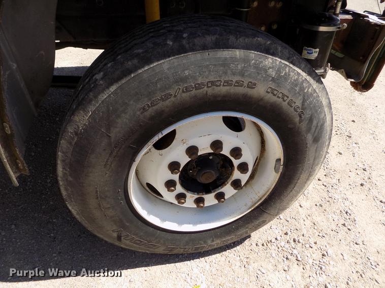 image for item DE1179 2004 Freightliner Business Class M2 hay bale stacker truck