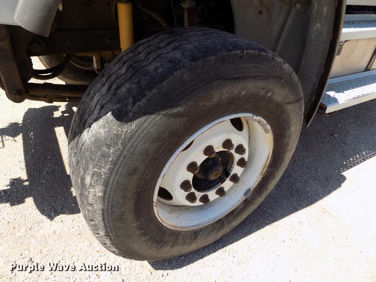 image for item DE1179 2004 Freightliner Business Class M2 hay bale stacker truck