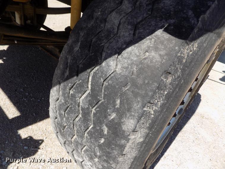 image for item DE1179 2004 Freightliner Business Class M2 hay bale stacker truck