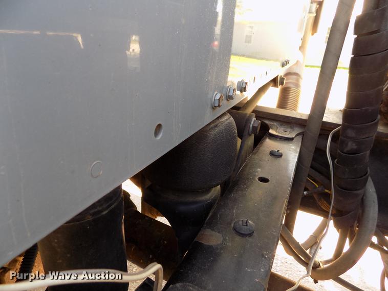 image for item DE1179 2004 Freightliner Business Class M2 hay bale stacker truck