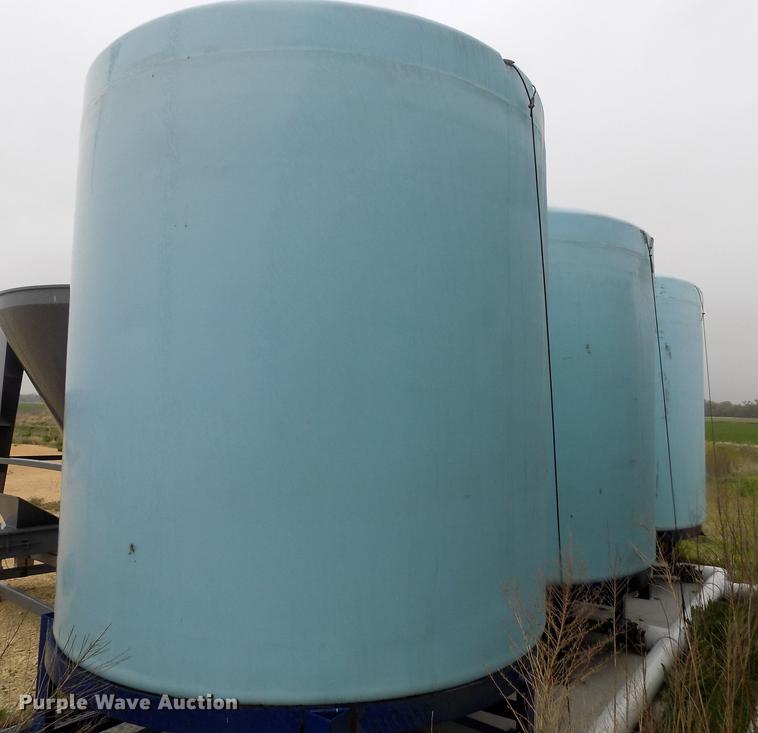 image for item DE1195 (3) cone bottom tanks with pump system