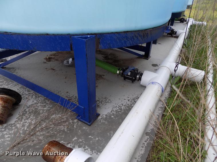 image for item DE1195 (3) cone bottom tanks with pump system