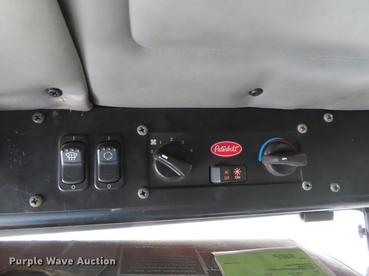 image for item DE3439 2010 Peterbilt 320 refuse truck