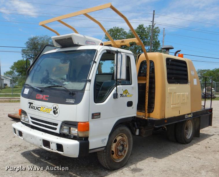 image for item DG1125 2003 GMC W5500 TrucKat flatbed truck