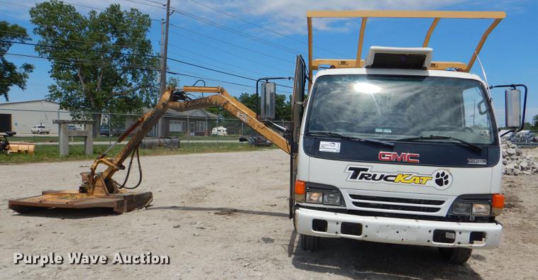 image for item DG1125 2003 GMC W5500 TrucKat flatbed truck