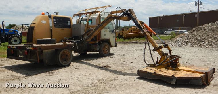 image for item DG1125 2003 GMC W5500 TrucKat flatbed truck