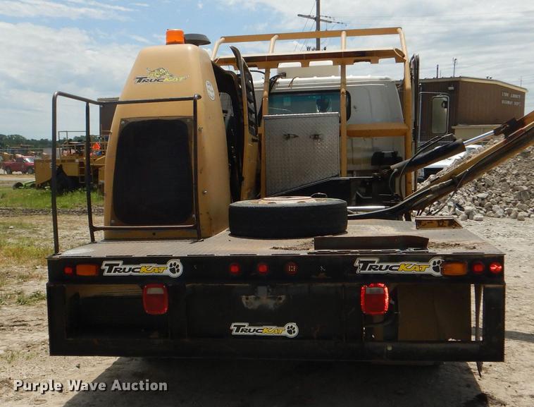 image for item DG1125 2003 GMC W5500 TrucKat flatbed truck