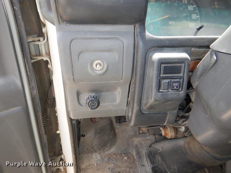 image for item DG1125 2003 GMC W5500 TrucKat flatbed truck