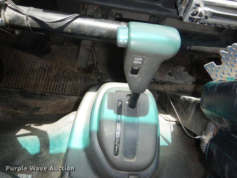 image for item DG1125 2003 GMC W5500 TrucKat flatbed truck