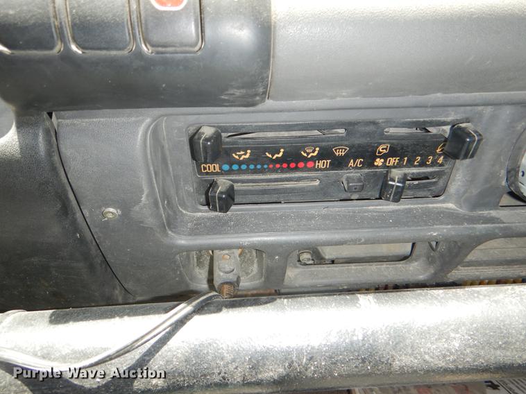 image for item DG1125 2003 GMC W5500 TrucKat flatbed truck