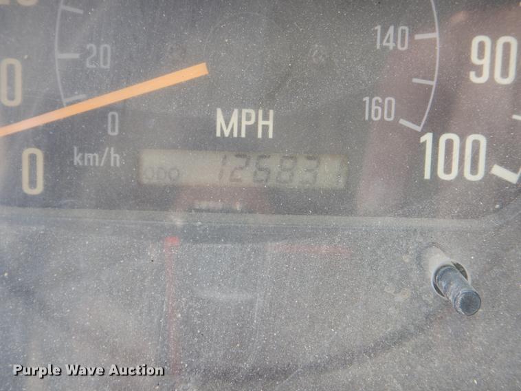 image for item DG1125 2003 GMC W5500 TrucKat flatbed truck