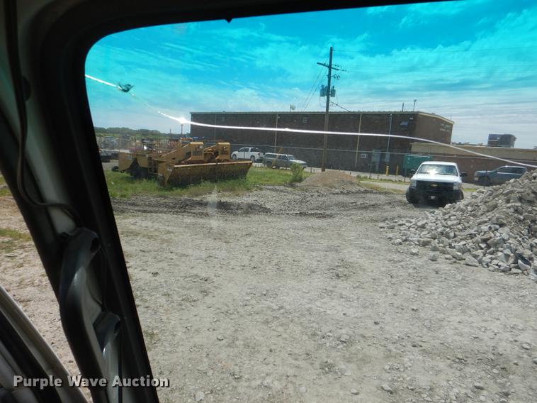 image for item DG1125 2003 GMC W5500 TrucKat flatbed truck