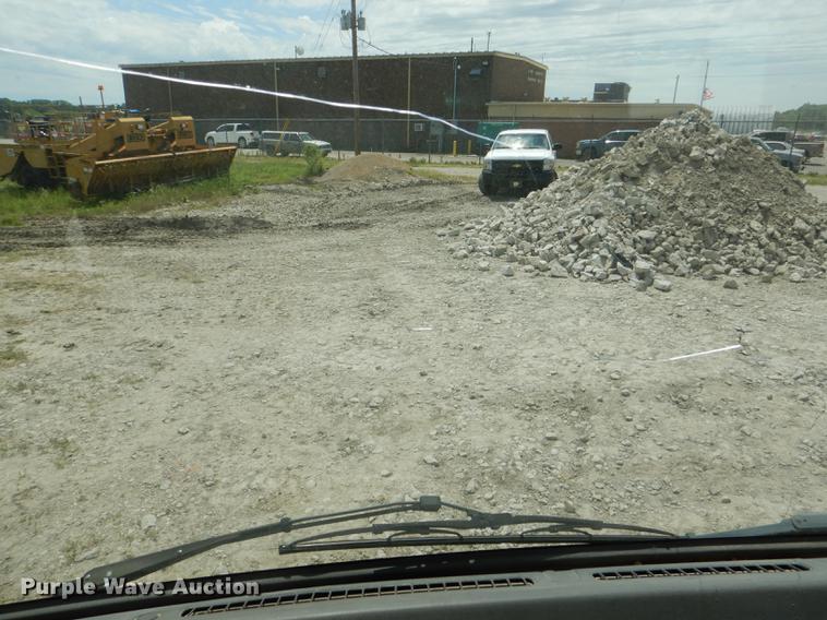 image for item DG1125 2003 GMC W5500 TrucKat flatbed truck