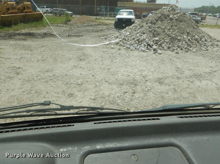 image for item DG1125 2003 GMC W5500 TrucKat flatbed truck