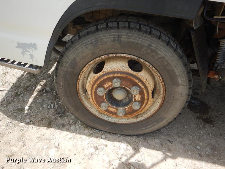 image for item DG1125 2003 GMC W5500 TrucKat flatbed truck