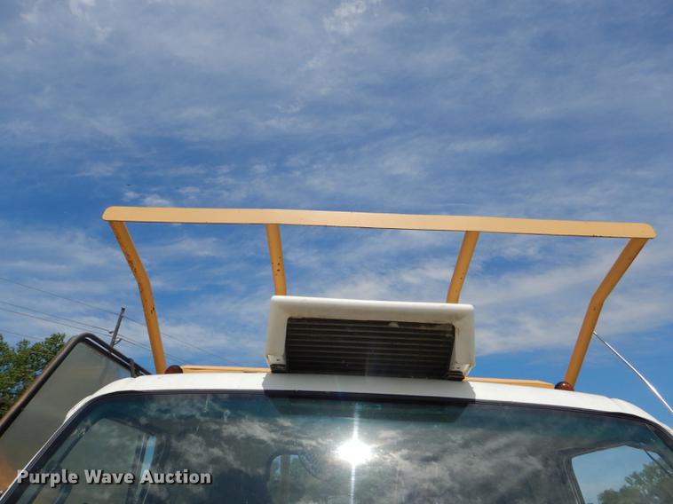 image for item DG1125 2003 GMC W5500 TrucKat flatbed truck