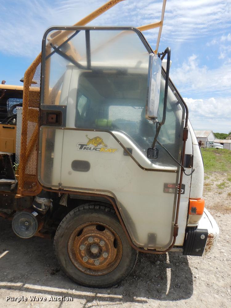 image for item DG1125 2003 GMC W5500 TrucKat flatbed truck