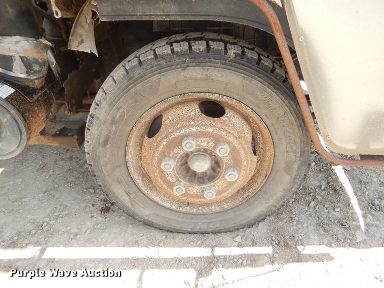 image for item DG1125 2003 GMC W5500 TrucKat flatbed truck