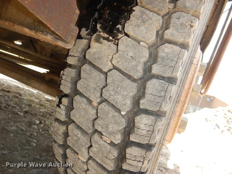 image for item DG1125 2003 GMC W5500 TrucKat flatbed truck