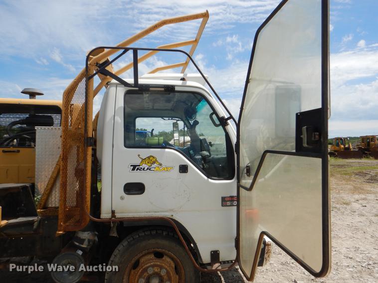 image for item DG1125 2003 GMC W5500 TrucKat flatbed truck