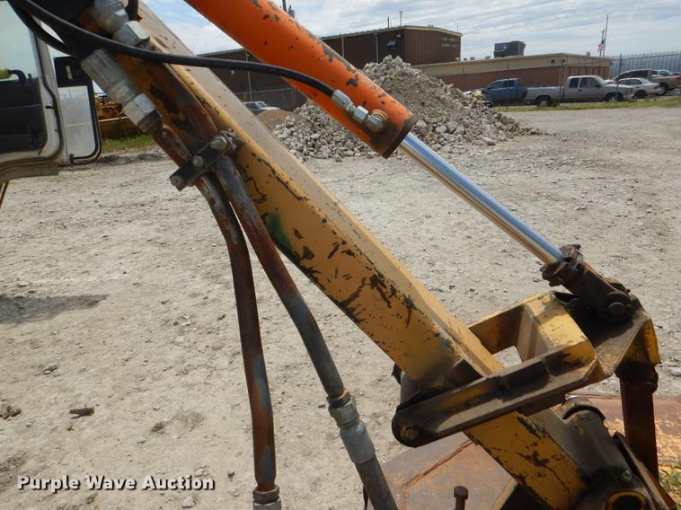 image for item DG1125 2003 GMC W5500 TrucKat flatbed truck