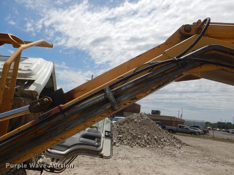 image for item DG1125 2003 GMC W5500 TrucKat flatbed truck