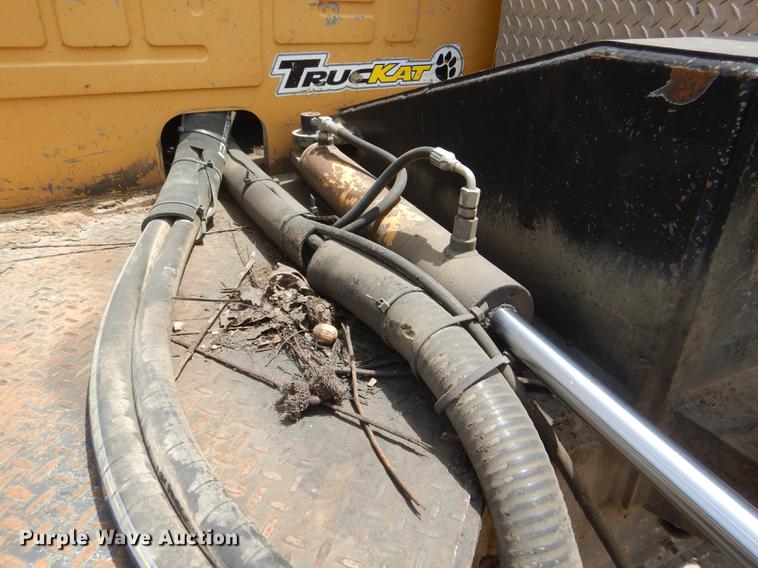 image for item DG1125 2003 GMC W5500 TrucKat flatbed truck