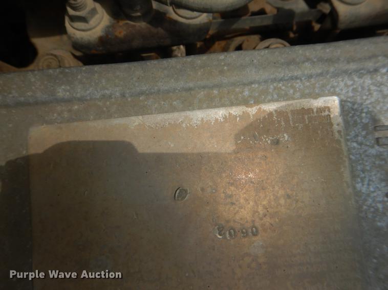 image for item DG1125 2003 GMC W5500 TrucKat flatbed truck