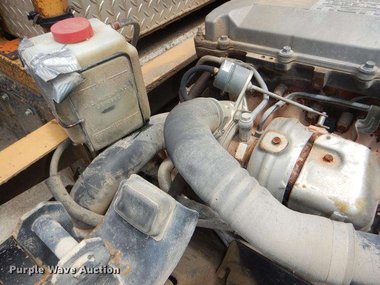 image for item DG1125 2003 GMC W5500 TrucKat flatbed truck