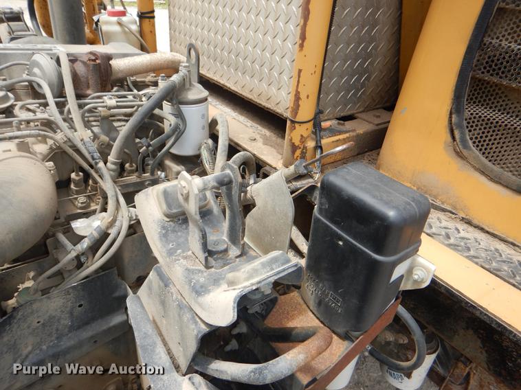 image for item DG1125 2003 GMC W5500 TrucKat flatbed truck