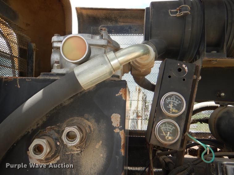 image for item DG1125 2003 GMC W5500 TrucKat flatbed truck