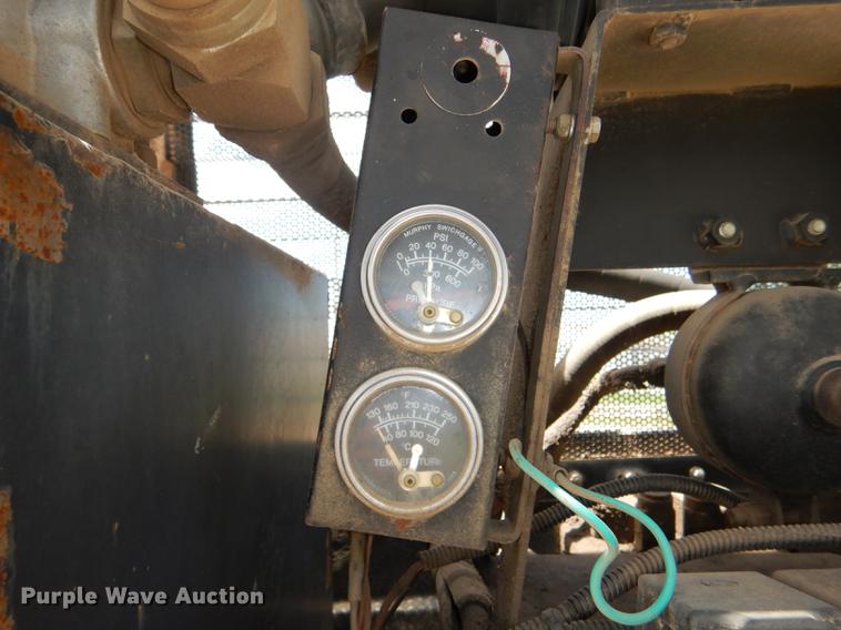 image for item DG1125 2003 GMC W5500 TrucKat flatbed truck