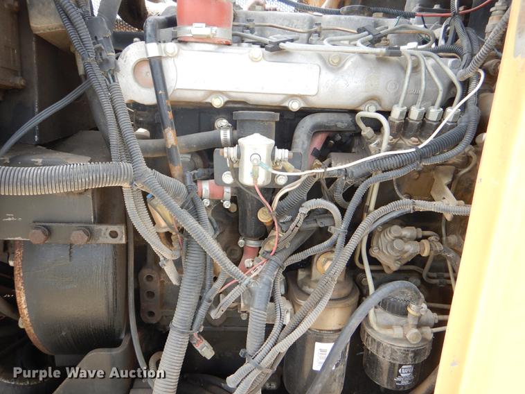 image for item DG1125 2003 GMC W5500 TrucKat flatbed truck