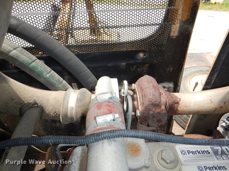 image for item DG1125 2003 GMC W5500 TrucKat flatbed truck