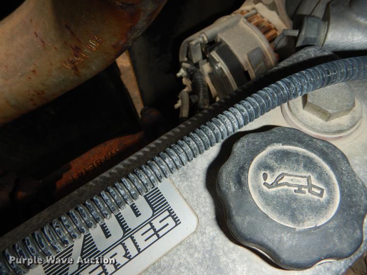 image for item DG1125 2003 GMC W5500 TrucKat flatbed truck