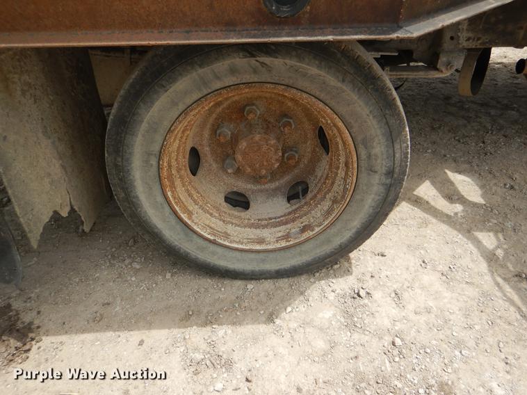 image for item DG1125 2003 GMC W5500 TrucKat flatbed truck