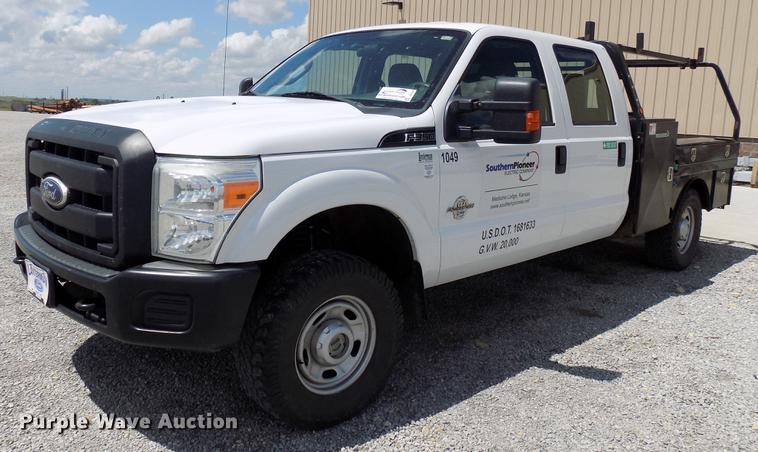 image for item DB9529 2011 Ford F350 Super Duty Crew Cab utility bed pickup truck