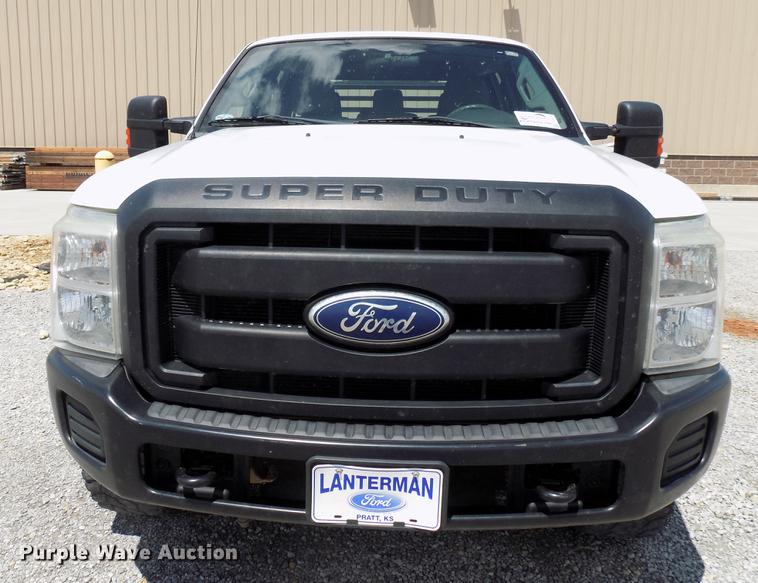 image for item DB9529 2011 Ford F350 Super Duty Crew Cab utility bed pickup truck