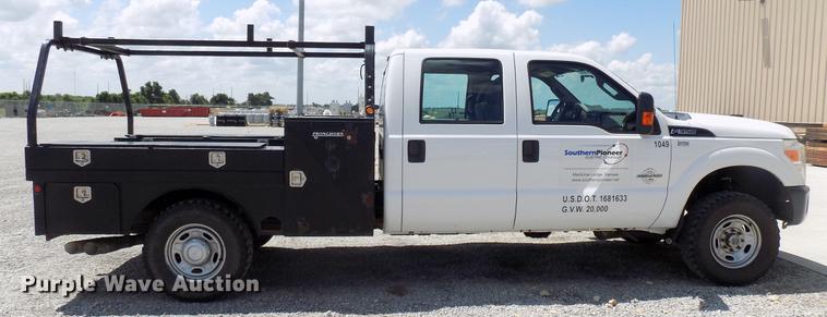 image for item DB9529 2011 Ford F350 Super Duty Crew Cab utility bed pickup truck