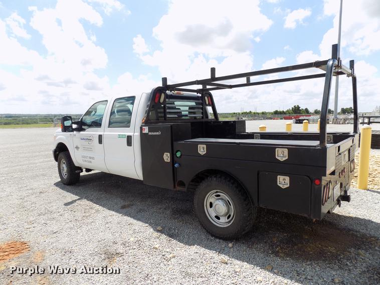 image for item DB9529 2011 Ford F350 Super Duty Crew Cab utility bed pickup truck