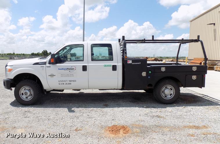 image for item DB9529 2011 Ford F350 Super Duty Crew Cab utility bed pickup truck