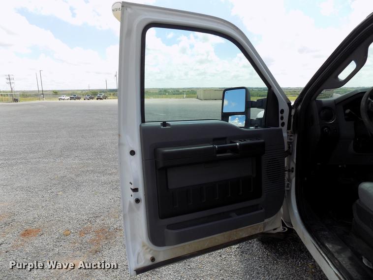 image for item DB9529 2011 Ford F350 Super Duty Crew Cab utility bed pickup truck