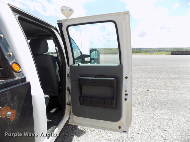 image for item DB9529 2011 Ford F350 Super Duty Crew Cab utility bed pickup truck