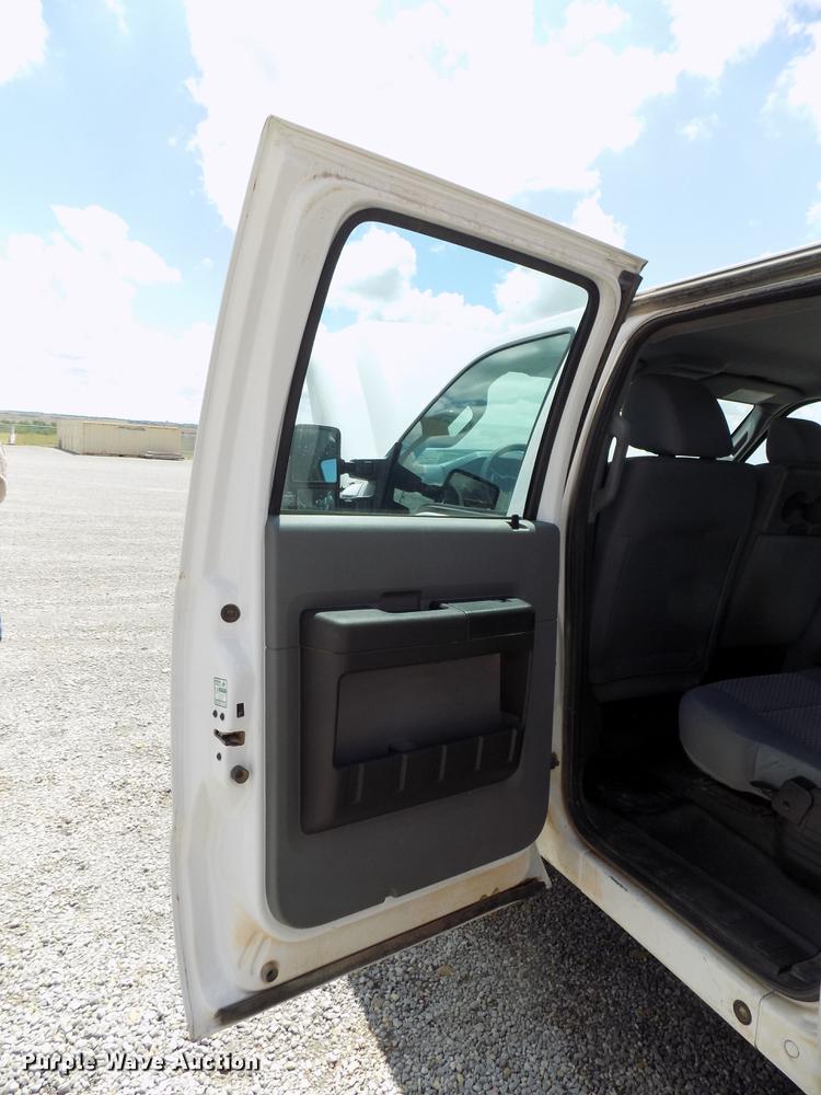 image for item DB9529 2011 Ford F350 Super Duty Crew Cab utility bed pickup truck