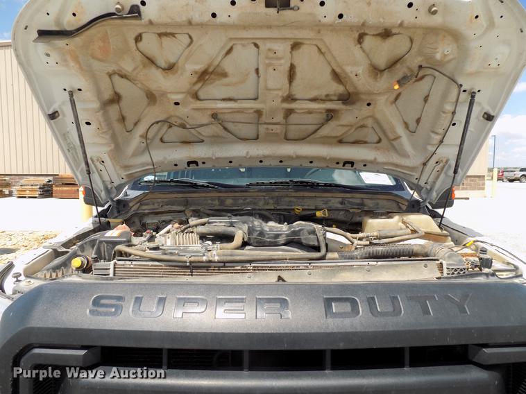 image for item DB9529 2011 Ford F350 Super Duty Crew Cab utility bed pickup truck