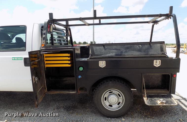 image for item DB9529 2011 Ford F350 Super Duty Crew Cab utility bed pickup truck